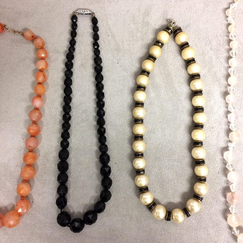 106 - Collection of beaded jewellery to include a carnelian carved strand