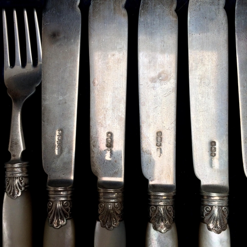 108 - A good cased set of Sterling silver fish knives and forks and servers, with mother of pearl handles,... 