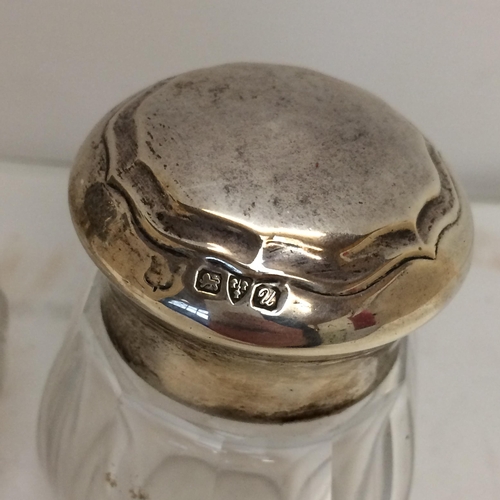 11 - Quantity of sterling silver lidded and white metal dressing table items (3 rounded top ones are hall... 