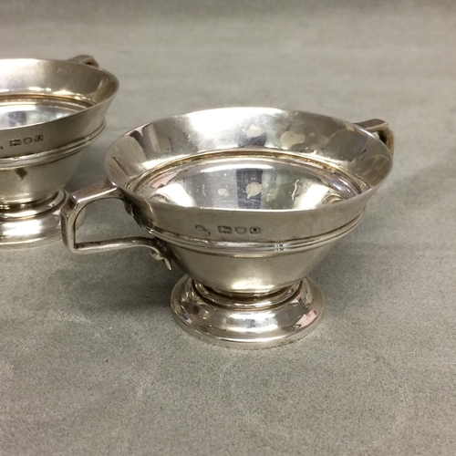 113 - Collection of Sterling silver salts and lidded mustard pots, to include a pair of circular salts rai... 