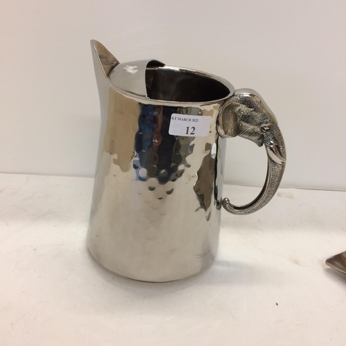 12 - Oriental silver plated planished jug and tray with applied elephant handles