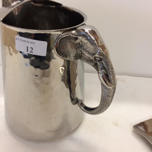 12 - Oriental silver plated planished jug and tray with applied elephant handles