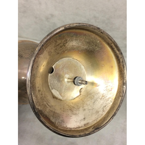 120 - Sterling silver trophy with scrolling handles on circular base, Birmingham 1936, 10.5ozt, 26cm H