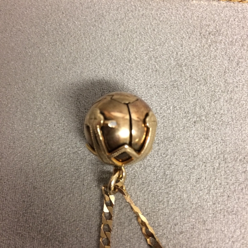 121 - Unmarked yellow metal masonic ball pendent, on a 9ct flat link necklace, 19.5g