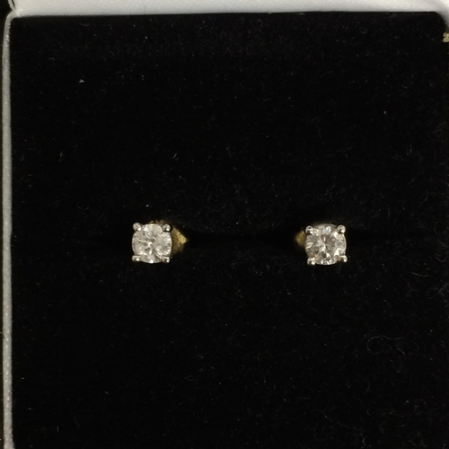 122 - Pair of 18ct yellow and white gold single stone diamond ear suds, single brilliant cut diamonds in f... 