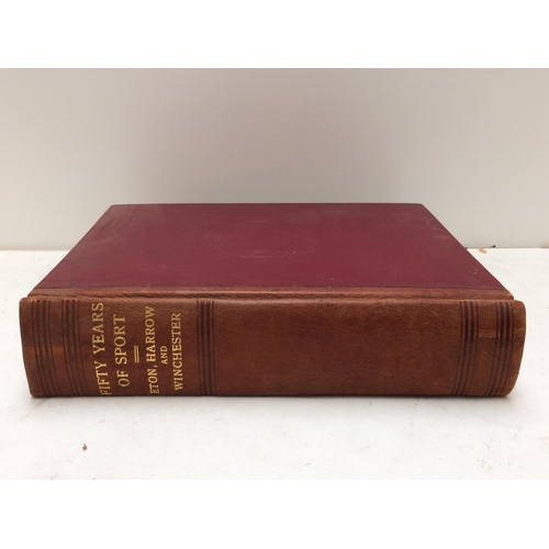 129 - Large red leather bound book, 