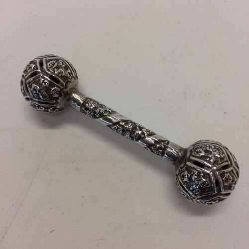 13 - Indian white metal baby rattle with pierced decoration