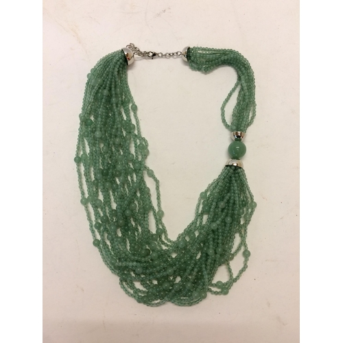 15 - Jade necklace, C20th, 3 strands of Jade (type 3) beaded multistrand necklace, in a Shanghai Tang fit... 