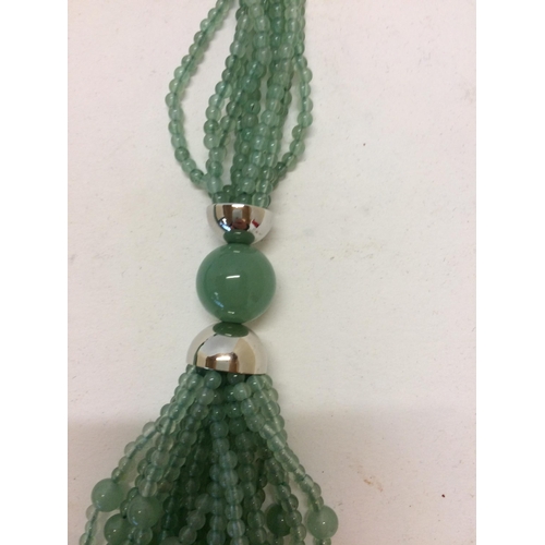 15 - Jade necklace, C20th, 3 strands of Jade (type 3) beaded multistrand necklace, in a Shanghai Tang fit... 