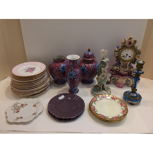 168 - Quantity of ceramics to include French ceramic mantle clock with matching stand, 2 cream candlestick... 