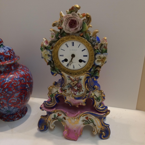 168 - Quantity of ceramics to include French ceramic mantle clock with matching stand, 2 cream candlestick... 