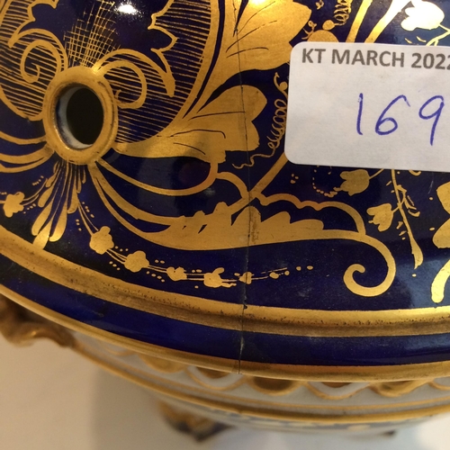 169 - Large ceramic lazy Suzanne with blue printed repeating design, and a Meissen style vase and a Sevre ... 