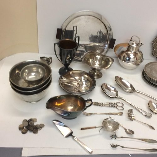 17 - Quantity of silver plated wares to include tea set, spoons, Danish circular tray, some modern orient... 