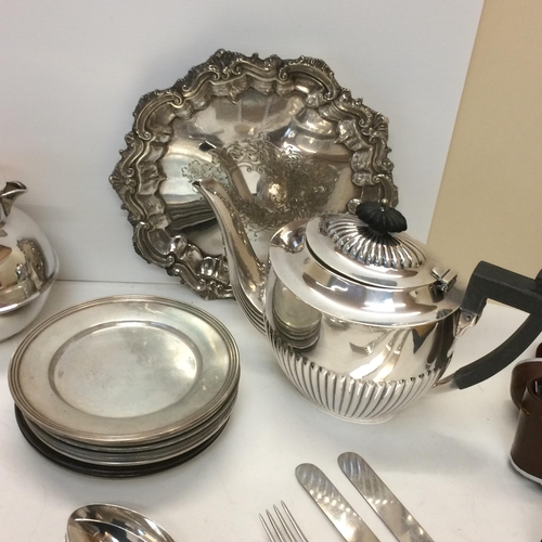 17 - Quantity of silver plated wares to include tea set, spoons, Danish circular tray, some modern orient... 