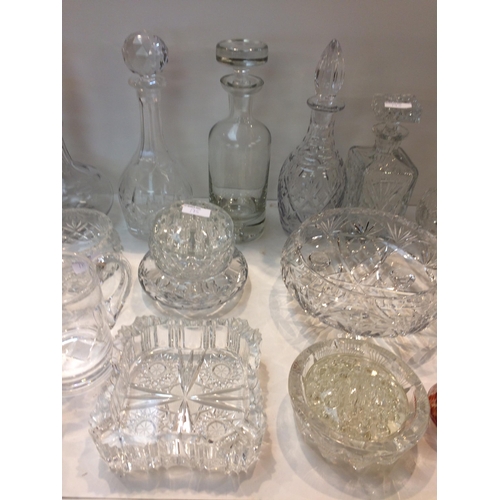 175 - Large quantity of C20th moulded glass decanters, bowls etc