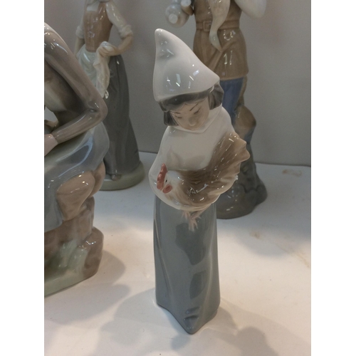 176 - Quantity of china to include Spanish ceramic figures in the Lladro Style, Lladro lady with chickens,... 