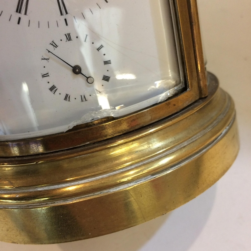 187 - French oval gilt brass four pane carriage clock, striking on a bell with key, losses to glass front ... 