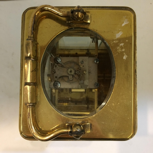 188 - French gilt brass carriage clock with 4 bevelled glass panes with key