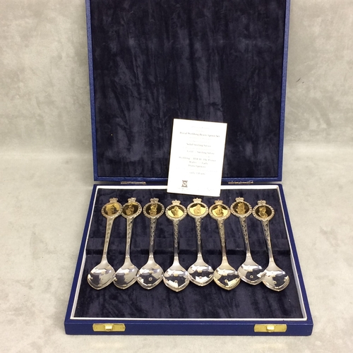 19 - A boxed st of 8 Sterling silver commemorative spoons, 