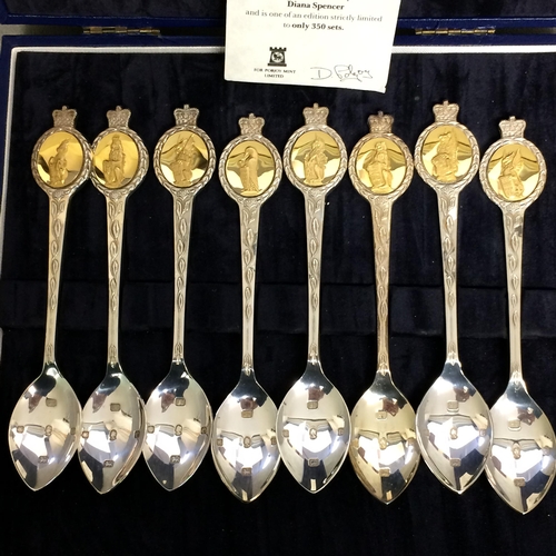 19 - A boxed st of 8 Sterling silver commemorative spoons, 