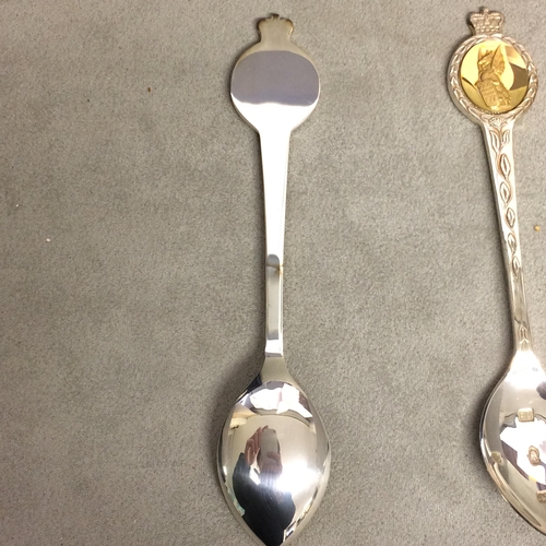 19 - A boxed st of 8 Sterling silver commemorative spoons, 