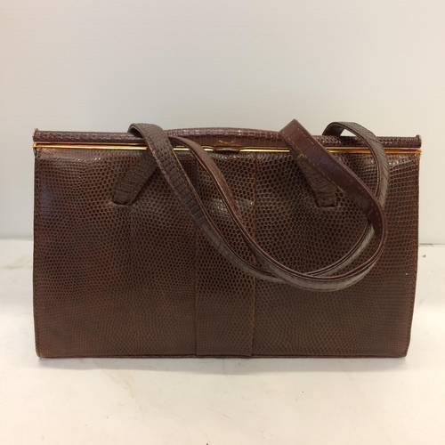 205 - Leather brief case, frame and handbag