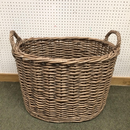 213 - A large oval two handled basket