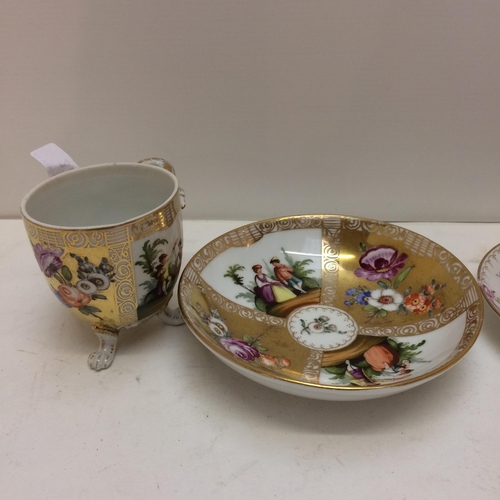 218 - Royal Worcester hand painted cabinet cup, and two continental C19th hand painted footed cups and sau... 