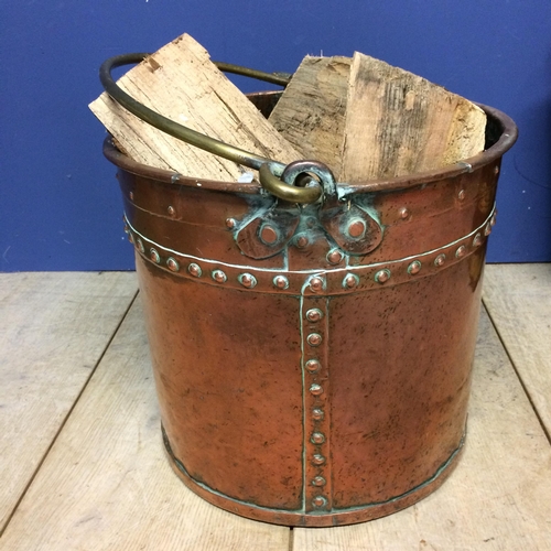 234 - Large brass bucket with handle (full of wood!)