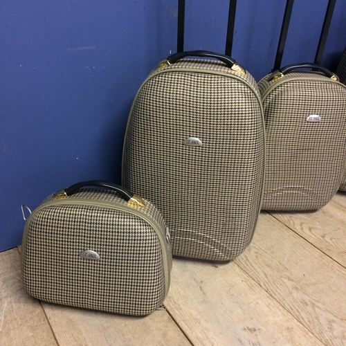 242 - Set of 4 piece matching luggage, St Paul, in a tartan /Burberry style finish