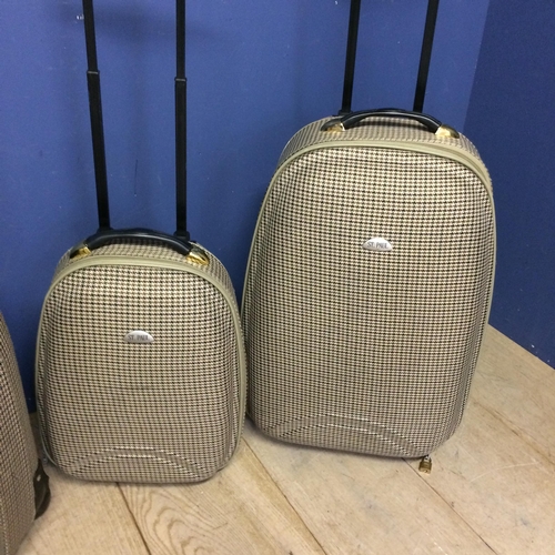 242 - Set of 4 piece matching luggage, St Paul, in a tartan /Burberry style finish