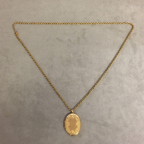 25 - 9 ct gold rope twist necklace with a 9ct gold oval picture locket with engraved decoration 12g