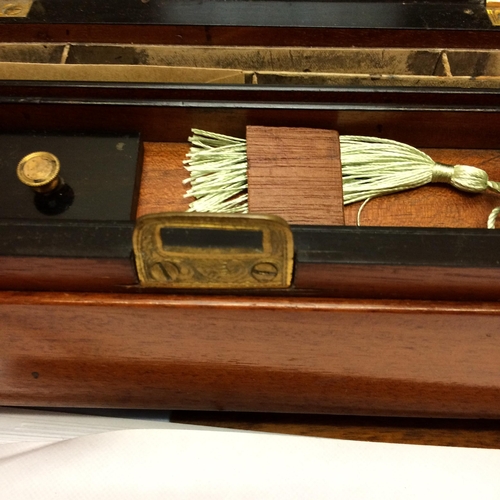 254 - A good burr writing slope, fitted interior with stationery tidy and inkwells, Labelled Pearoe Maker,... 