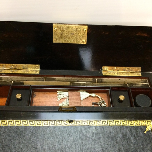 254 - A good burr writing slope, fitted interior with stationery tidy and inkwells, Labelled Pearoe Maker,... 