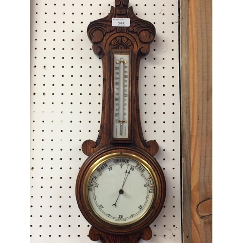 255 - 3 Barometers - a stick barometer, and an oak framed wall barometer, and an oak framed barometer on w... 