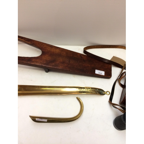 264 - A long brass shoe horn, and a short one, a mahogany boot jack, a pair of Vintage binoculars in case ... 