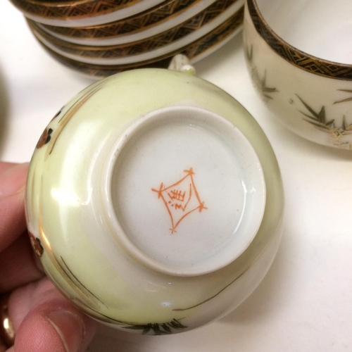 276 - Japanese Noritake ceramic tea service, decorated landscapes; and a Japanese Noritake egg shell porce... 