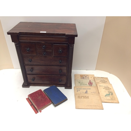 278 - A Scottish, oak Apprentice cabinet/specimen 7 drawer cabinet, and a quantity of cigarette cards