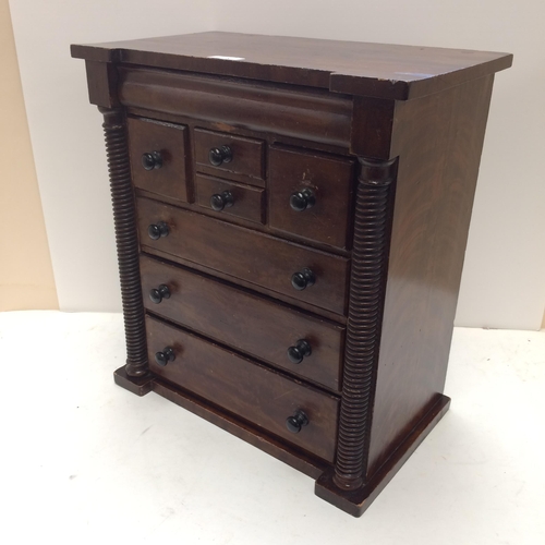 278 - A Scottish, oak Apprentice cabinet/specimen 7 drawer cabinet, and a quantity of cigarette cards