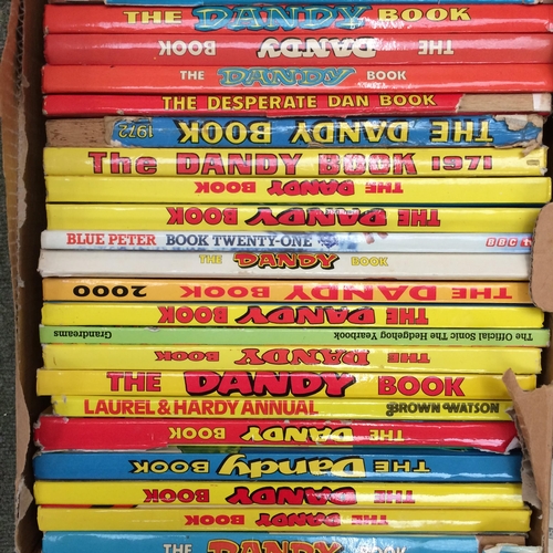 282 - A quantity of 1970s, 1980s, and later comic books, including mainly The Dandy Books,  and Blue Peter... 