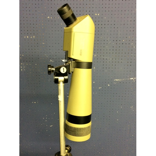 296 - a modern telescope on tripod stand