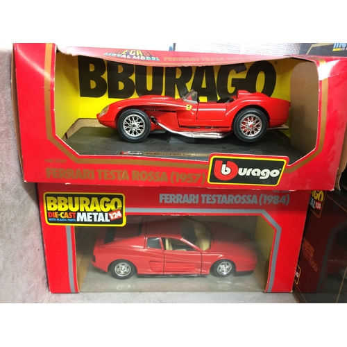 395 - A collection of Burago die cast metal boxed toy cars of various scales to include a Mercedes Benz 50... 