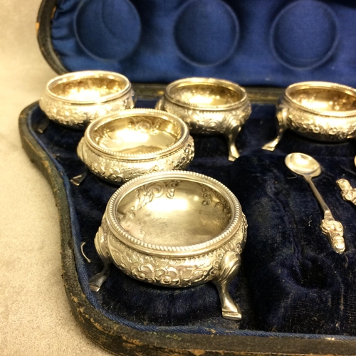 4 - Cased  set of 10 Victorian sterling silver salts, each with chased decoration and beaded rim raised ... 