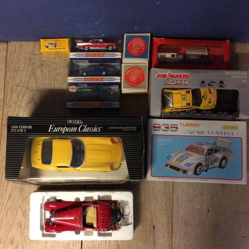 400 - A collection of die cast model vehicles of various makers and scales to include Corgi, Majorette and... 