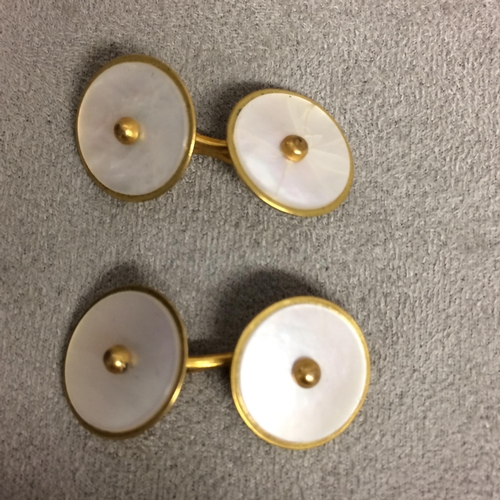 46 - Collection of unmarked yellow metal and mother of pearl cufflinks and dress studs, 18g