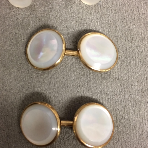 46 - Collection of unmarked yellow metal and mother of pearl cufflinks and dress studs, 18g