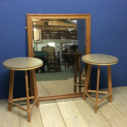 475 - A modern pine wall mirror,  and 2 chip board circular top tables