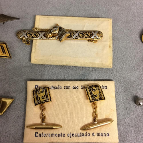 48 - Collection of unmarked yellow and white metal dress items to include cufflinks, dress studs, and oth... 