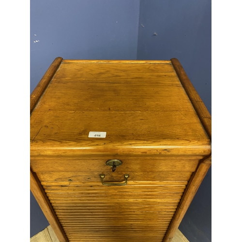 498 - A vintage honey coloured oak tambour fronted cabinet