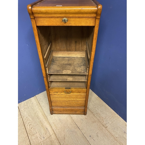 498 - A vintage honey coloured oak tambour fronted cabinet